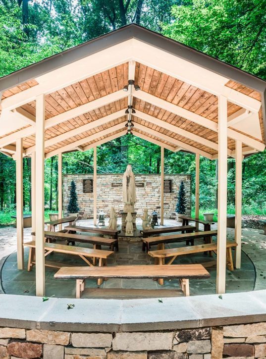 Open-air pavilion with a statue of Our Lady of Fatima