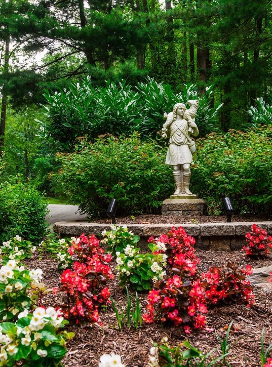 Statue of the Good Shepherd carrying a lamb